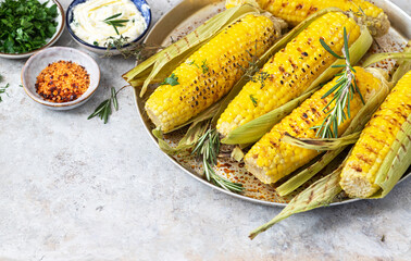 Grilled sweet corn with herbs and salt. Summer food