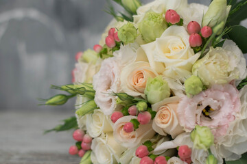 Delicate blossoming roses and blooming flowers festive background, pastel and soft bouquet floral card, selective focus.
