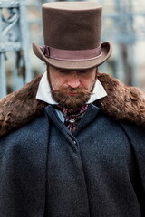 Elegant man in a 19th century suit clothes