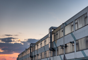 Wall of a factory in the sunshine