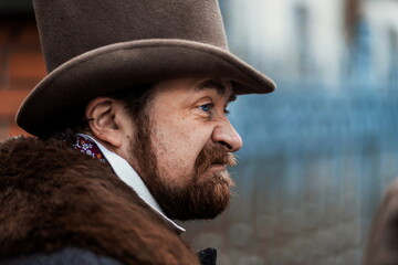 Elegant man in a 19th century suit clothes