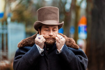 Elegant man in a 19th century suit clothes