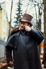 Elegant man in a 19th century suit clothes