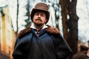 Elegant man in a 19th century suit clothes