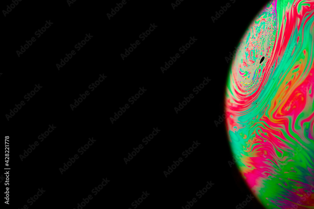 Wall mural soap bubble. abstract galaxy background with globe planet earth in universe space with sunlight on d