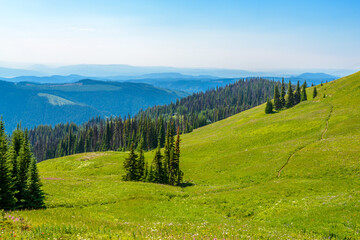 Obraz premium Beautiful landscape of valley in Alpine mountains, small trail, hike root, majestic picturesque view in sunny day