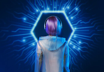 Beautiful woman with purple hair in futuristic costume on dark background. Girl in glasses of virtual reality. Augmented reality game, future technology, AI concept. Holographic interface.