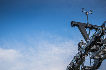 Fototapeta na wymiar Queenstown gondola ski lift with sky in background