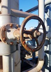 Closing or opening for gas or water supply through a pipeline. Shut-off valves on the pipeline close-up