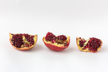 Red ripe juicy garnet fruit pomegranate grains closeup macro 