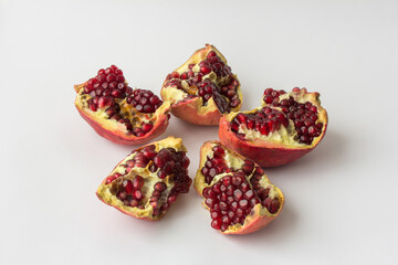 Red ripe juicy garnet fruit pomegranate grains closeup macro 