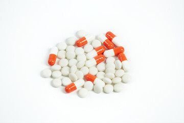 Set of multicolored pills isolated on white background. Close up.