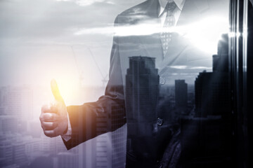 Double exposure of young business man and digital number of stock market background to represent successful in investment marketing. Find out the best solution in business and financial as concept.