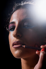 Obraz premium Beautiful woman with professional makeup contouring lips