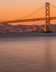 Golden Gate Bridge in San Francisco Bay near Sunset.