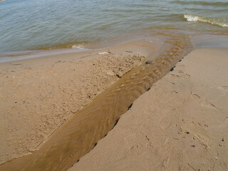 Stream flowing into the Curonian Lagoon of the Baltic Sea