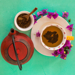 cup of tea with lemon and cinnamon