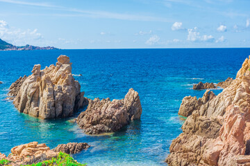 Obraz premium Crystal clear waters of Li Cossi beach, Sardinia