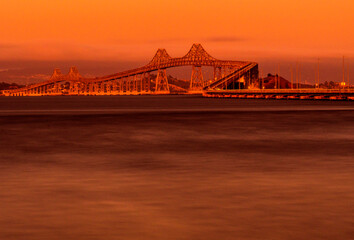 Fototapeta na wymiar The Richmond–San Rafael Bridge, at night, is the northernmost of the east–west crossings of the San Francisco Bay in California.
