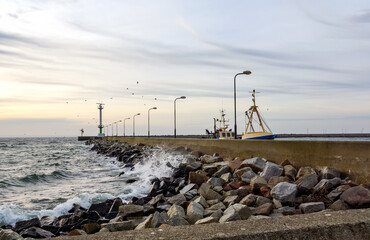 Poland, Hel - pier on the coast at winter time. 