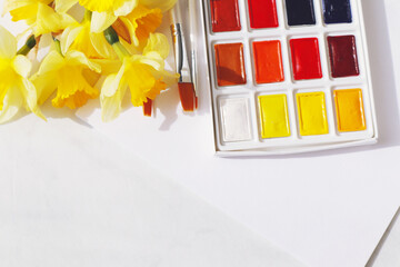 Beautiful bright watercolor paints on light background