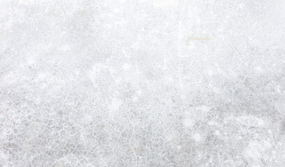 Light grey stained concrete floor of exterior architecture, rough surface construction material. Monochrome abstract background of loft industry design concept with copy space.