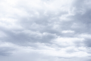 Cloudscape scenery, overcast weather above dark blue sky. Storm clouds floating in rainy day,...