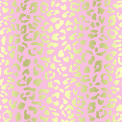Seamless golden leopard pattern in vector on a pink background 