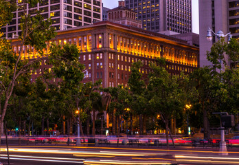 Southern Pacific Building, San Francisco, lights plus car lights, night. Skyline