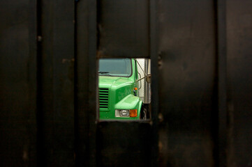 Hidden Green Shipping Truck