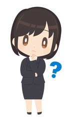 首をかしげるビジネススーツ姿の女性