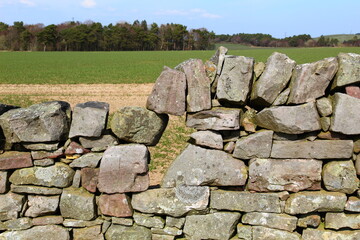 stone wall at the Pentland Hills Regional Park in Edinburgh Scotland 