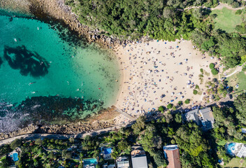 Panoramic aerial bird's eye view of Shelly Beach at the southeastern end of Manly, a beachside...