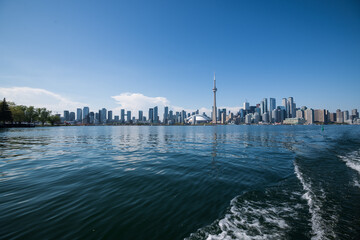 Toronto's skyline seen from a boat on the Inner Harbour on a perfect summer afternoon.