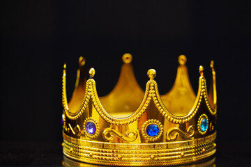 golden crown isolated on black