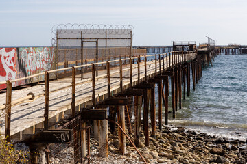 closed off security at the start of the old Rapid Bay jetty ruins on the Fleurieu Peninsula South Australia on April 12th 2021