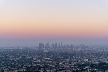 Naklejka na ściany i meble Sunset over downtown Los Angeles from Griffith Observatory