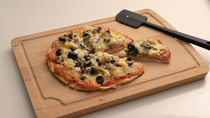 A delicious homemade italian Pizza with extra topping. A healthy lifestyle gourmet