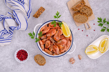 Unpeeled cooked prawns