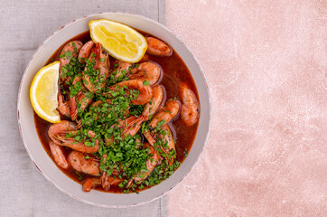 Unpeeled cooked prawns