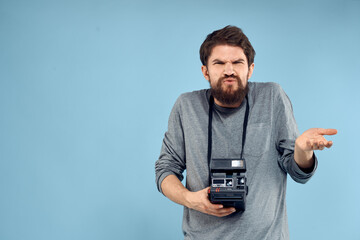 Male photographer Professional hobby blue technology background