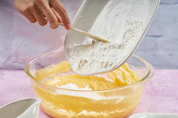 Prepared cornstarch alfajores.  Adding flour and cornstarch to prepare alfajores