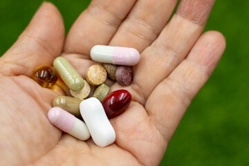 Handful of pills medicine daily dose for patient