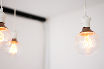 Lamp decorations in a bright clean room with white wall background.