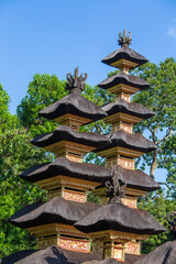 The architecture of the Hindu temple on the island of Bali in Ubud, Indonesia, Asia. High thatched roof tower