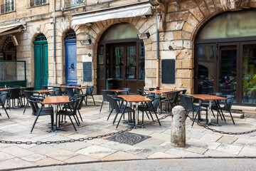 Fototapeta na wymiar Table serving in a restaurant in Lyon. France. Street, summer, outdoor