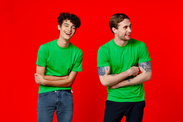 two man holding his neck emotions discontent red background