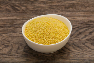 Raw cous cous heap in the bowl