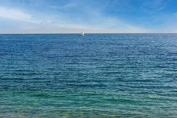 Obraz premium sailboat on the horizon of the Adriatic sea