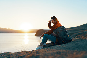 woman tourist backpack landscape sunrise vacation travel